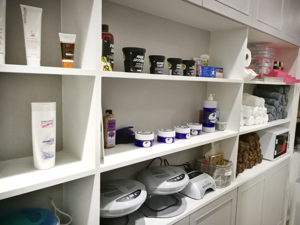 Row of beauty products on a shelf